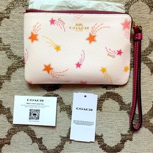 Coach corner zip wristlet with shooting star print NWT